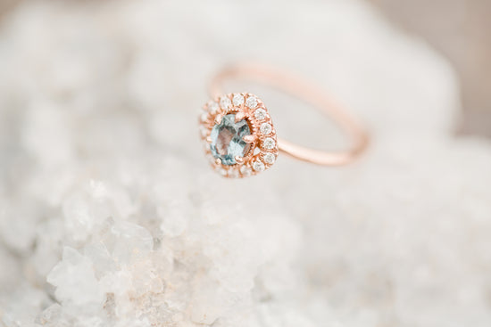 Blue Moissanite ring with halo and rose gold band