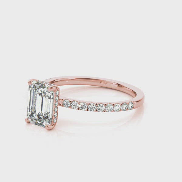 14k Rose Gold Emerald Cut engagement ring with half eternity pave band and hidden halo